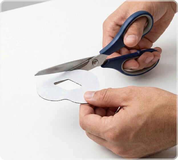 If needed, trim tape with scissors to fit their face.